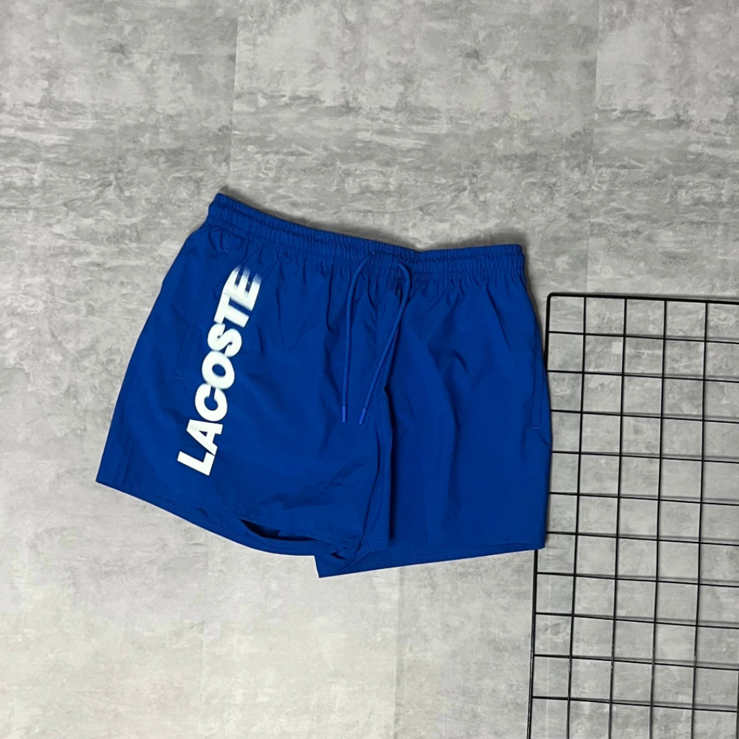 SHORT LACOSTE LETREIRO - AZUL